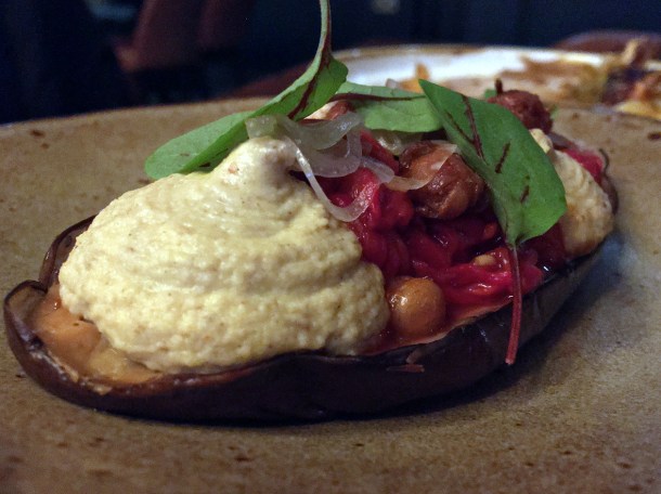 illustrative photo of the almond hummus with aubergine and pomegranate at Opera Tavern
