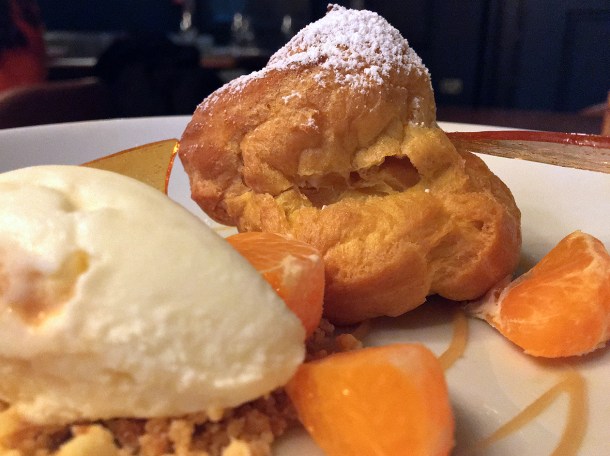 illustrative photo of the citrus beignet at Opera Tavern