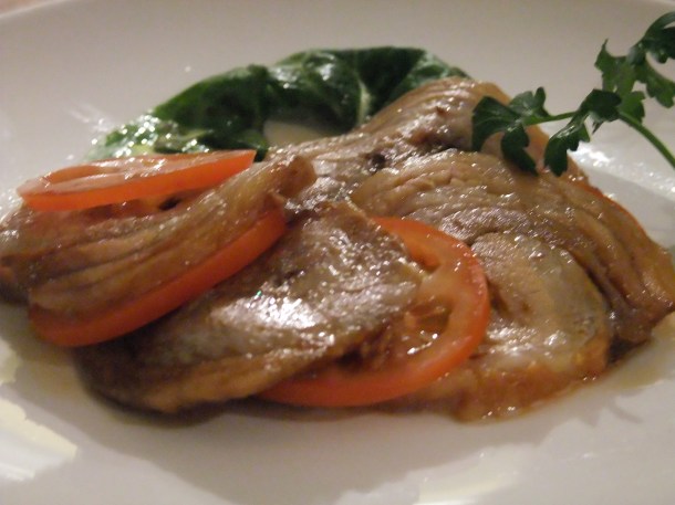 Thinly sliced, slow cooked pork belly