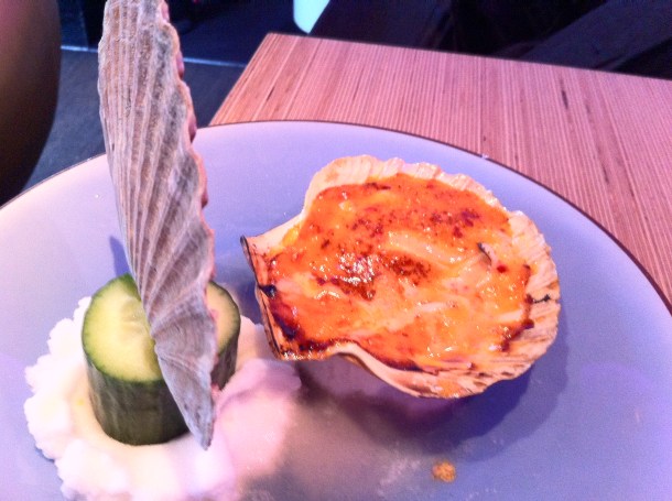 Grilled Scallops with masago & a creamy spicy sauce flambéed with whisky.
