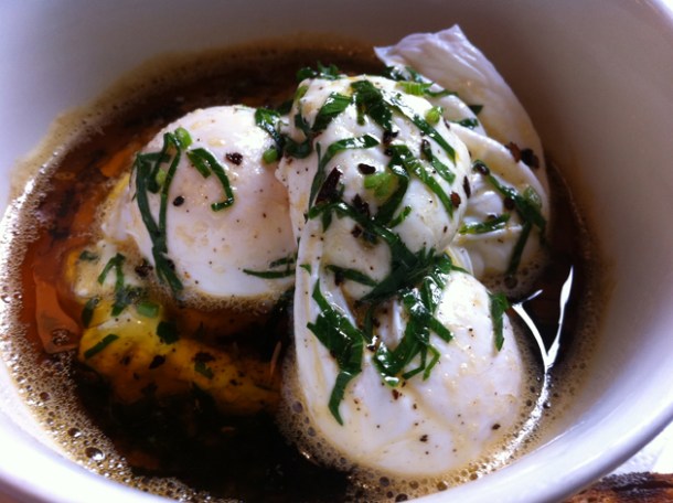 two poached eggs with whipped yoghurt and hot chilli butter