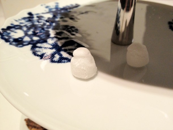 petit fours crisp white shell filled with lemon herb liquid at Moments Barcelona petit fours crisp white shell filled with lemon herb liquid at moments mandarin oriental hotel barcelona