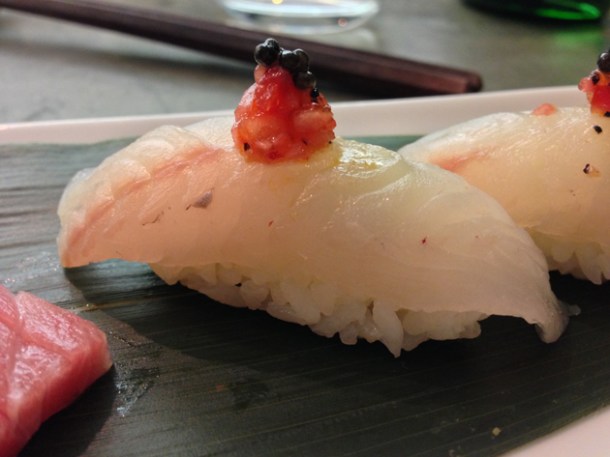 gurnard nigiri sushi with onion, tomato and pepper salsa at dinings