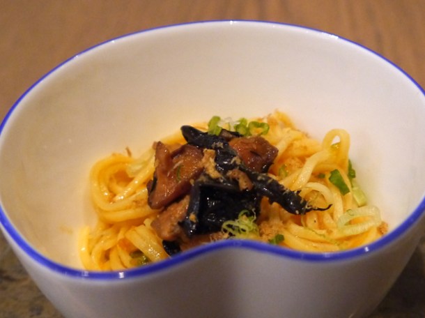 egg noodles stir fried with chilli oil and topped with mushrooms and spring onions at bo london