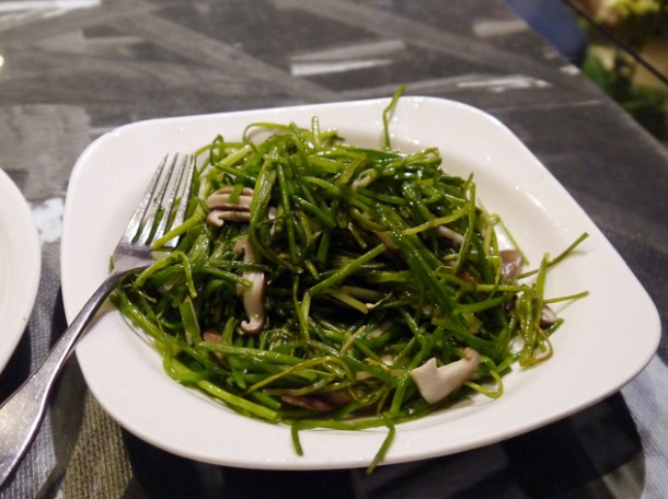 water greens with mushrooms in sesame oil at five cent driftwood house