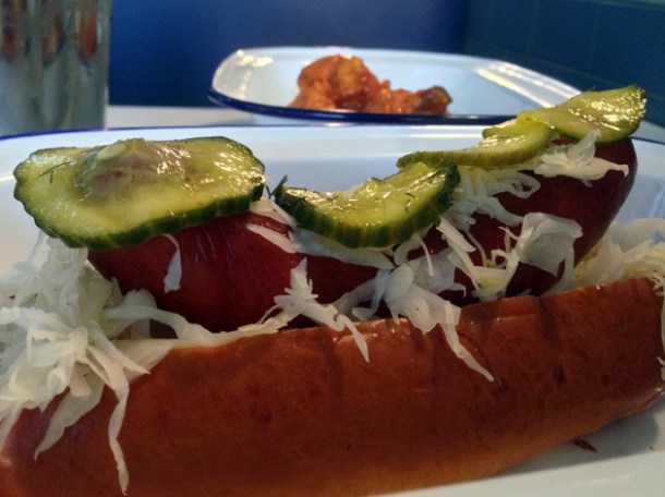 pork hotdog with sauerkraut at burger and shake