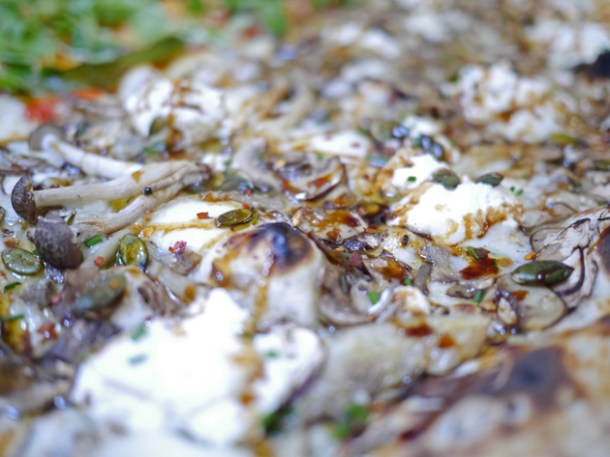 mushroom, ricotta and pumpkin seeds pizza at homeslice