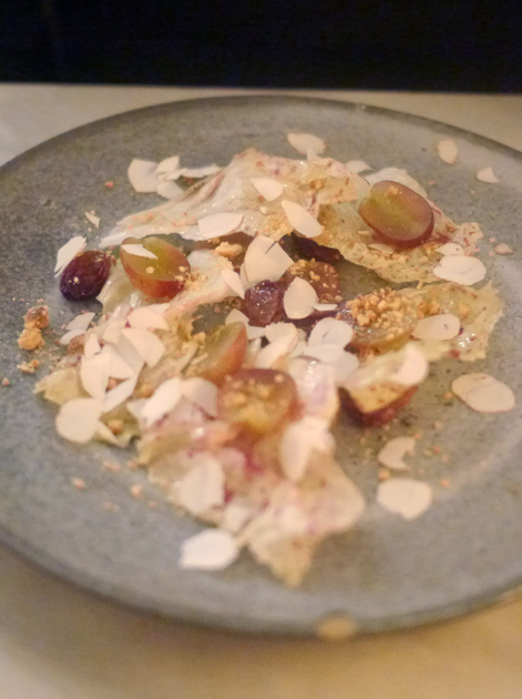 cobnuts, bitter leaf and raisins at the clove club