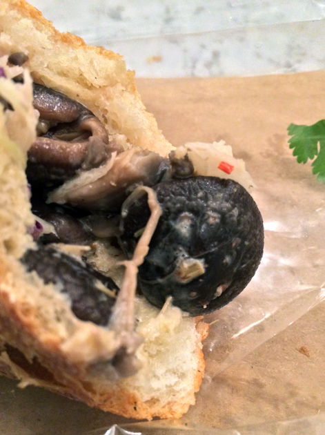 close up of mushroom banh mi at bep haus