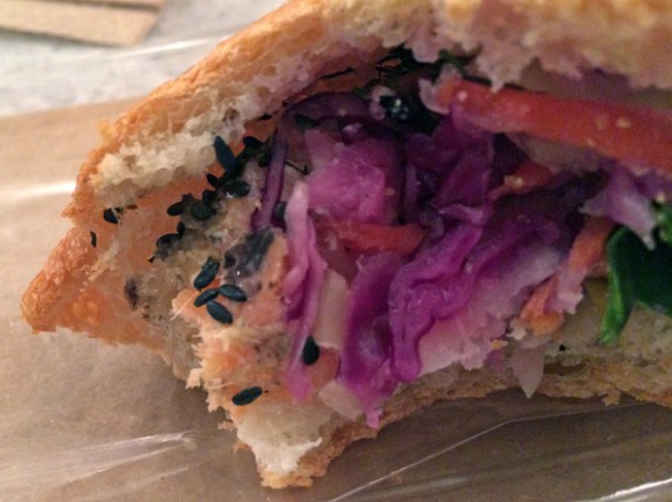 close up of salmon and toasted sesame banh mi at bep haus