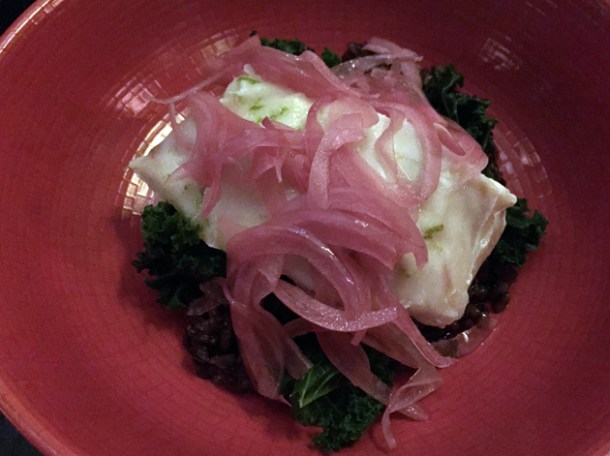poached hake with pickled onion and black rice at tredwells