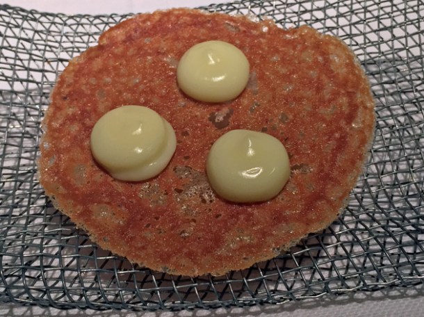 crisp topped with olive oil drops at pipero al rex