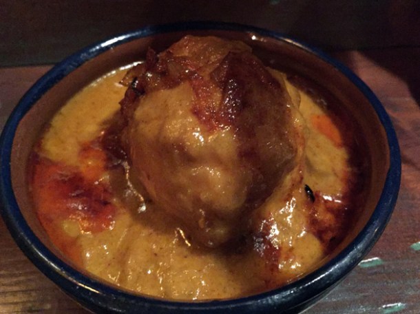 egg curry with biryiani at hoppers