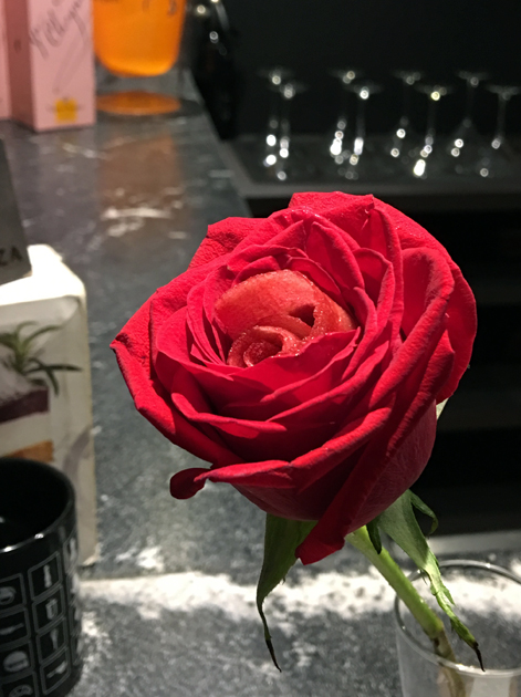 curl of apple tinted with beetroot nestled in a rose at benazuza