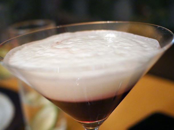 port cherry juice and peking duck whiskey sour foam cocktail at a wong