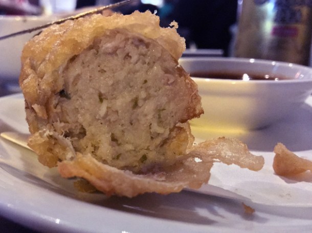 battered fried sausage sliced at gilly's fry bar