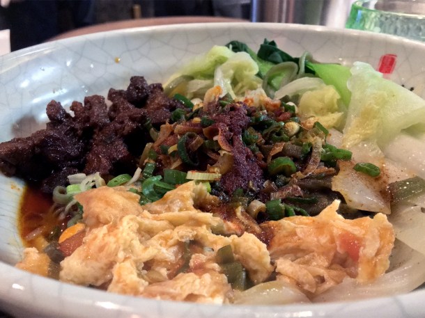 spinach-noodles-with-braised-pork,-egg-and-tomato-at Murger Hanhan