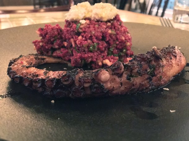 octopus and sour cherry bulgur wheat at yeni
