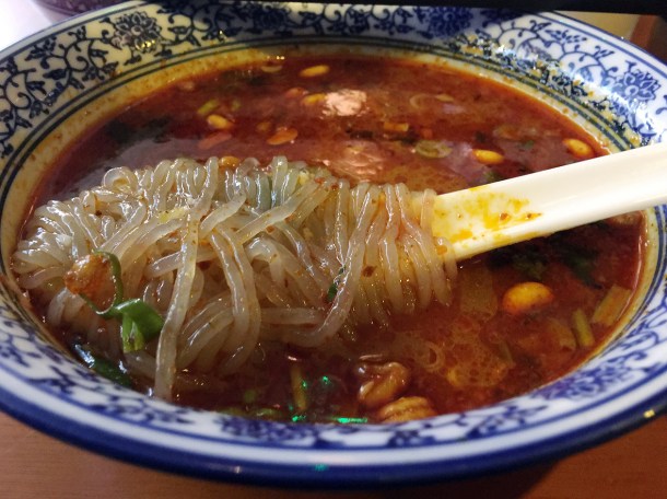 sweet potato noodles in hot and sour soup at master wei