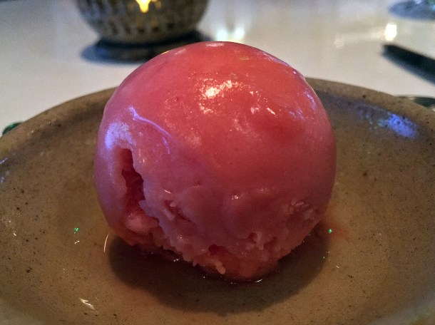 illustrative photo of the blood orange sorbet mid-tasting menu palate cleanser at Kanishka