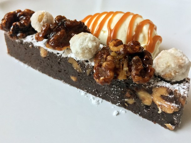 illustrative photo of the chocolate and nut brownie with butterscotch sauce at Siren at The Goring Hotel