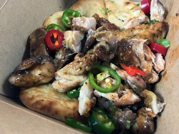 illustrative photo of the jerk chicken naan from Juici Jerk at Mercato Metropolitano Southwark