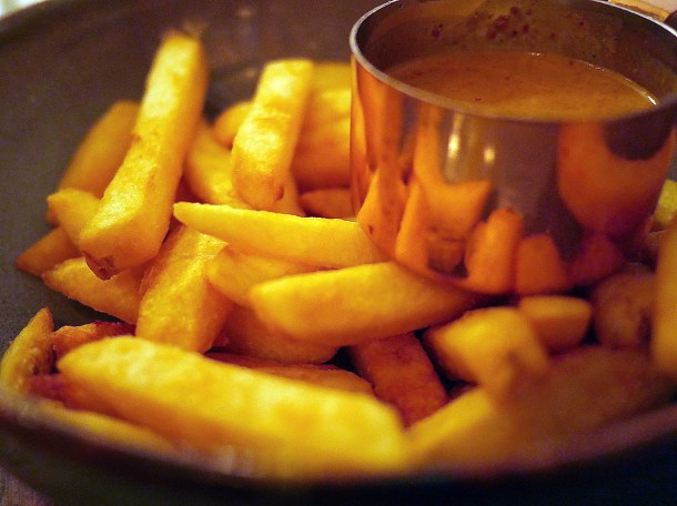illustrative photo of the chips with curry sauce at Mc and Sons