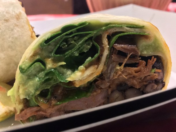 illustrative photo of the al pastor pork burrito from Breddos at Flat Iron Square
