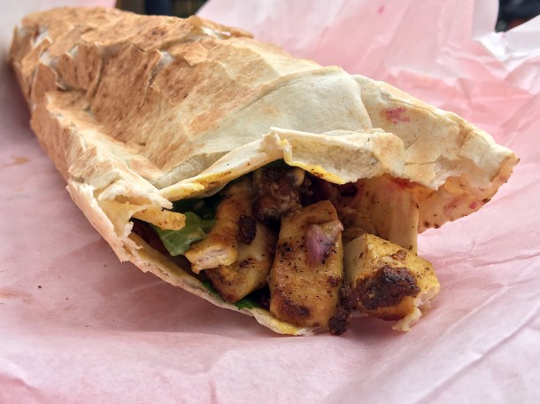 illustrative photo of the chicken flatbread from Laffa at Flat Iron Square
