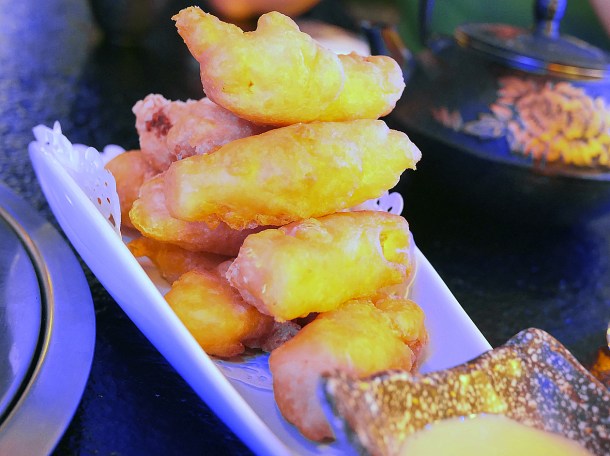 illustrative photo of the condensed milk doughnuts with condensed milk for dipping at Seveni