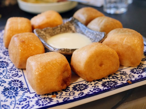 illustrative photo of the deep fried mini steamed buns with condensed milk at Seveni