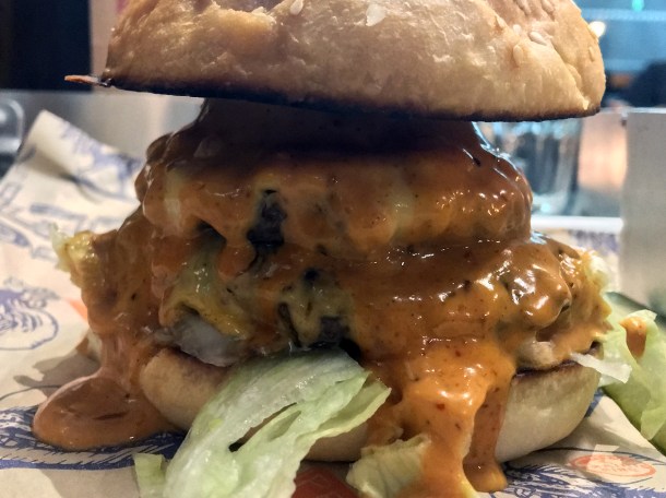 illustrative photo of the signature burger at Prairie Fire