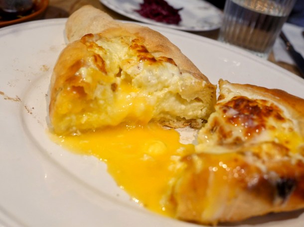illustrative photo of the khachapuri acharuli cheese egg flatbread at The Georgian