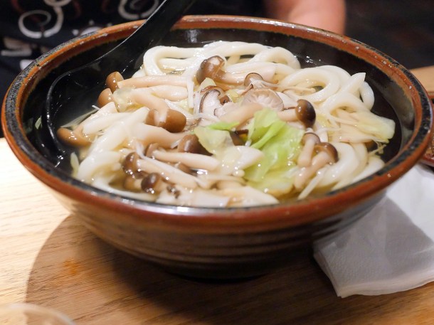 illustrative photo of the hot udon in hot broth with mushrooms at Koya City