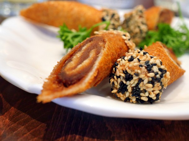illustrative photo of the sesame rolls stuffed with red bean paste at Tofu Vegan