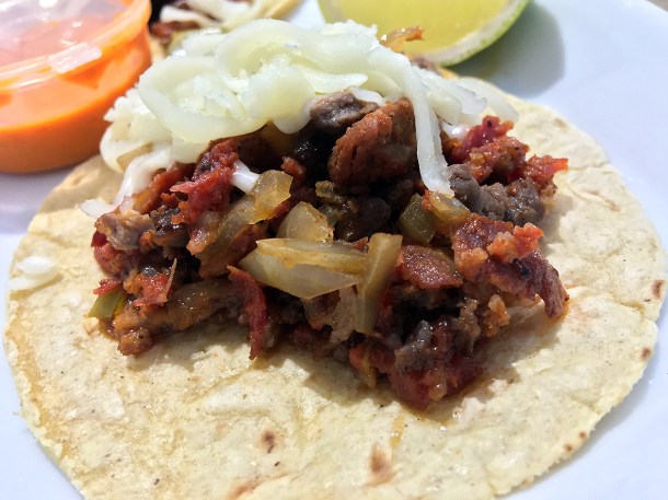 illustrative photo of the alhambre meat and cheese tacos at La Chingada