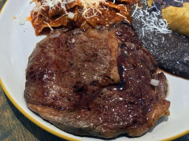 illustrative photo of the chilaquiles and steak at La Chingada