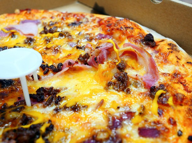 illustrative photo of the bacon double cheeseburger pizza from Twisted Slice