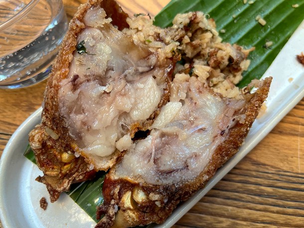illustrative photo of the split open deep fried pig trotter at Sarap Bistro Mayfair