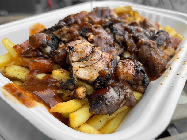 illustrative image of the jerk chicken with fries at Jerk Yard