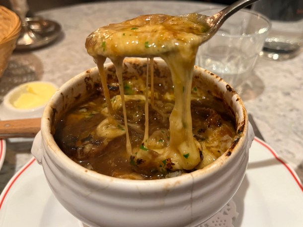 illustrative photo of the gooey crust of the onion soup at Josephine Bouchon