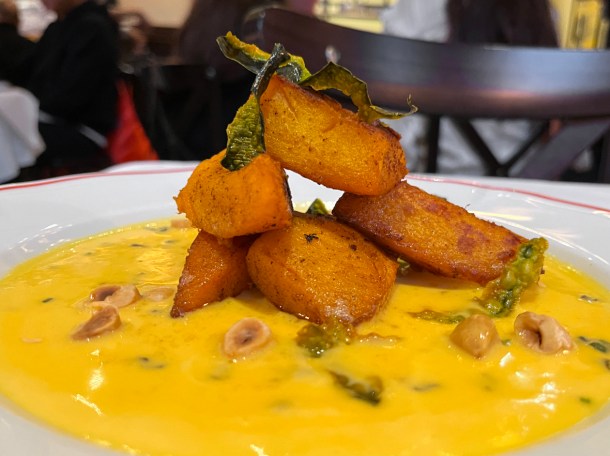 illustrative photo of the pumpkin and hazelnuts in mimolette cream at Josephine Bouchon