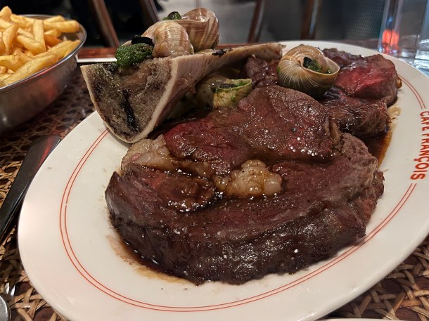 illustrative photo of the prime rib with bone marrow, escargots and frites at Cafe Francois