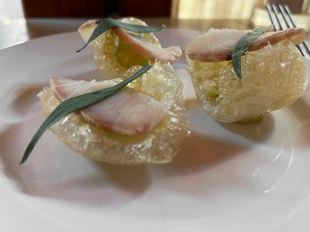 illustrative photo of the puffed pigs skin, smoked eel and tarragon at Camille